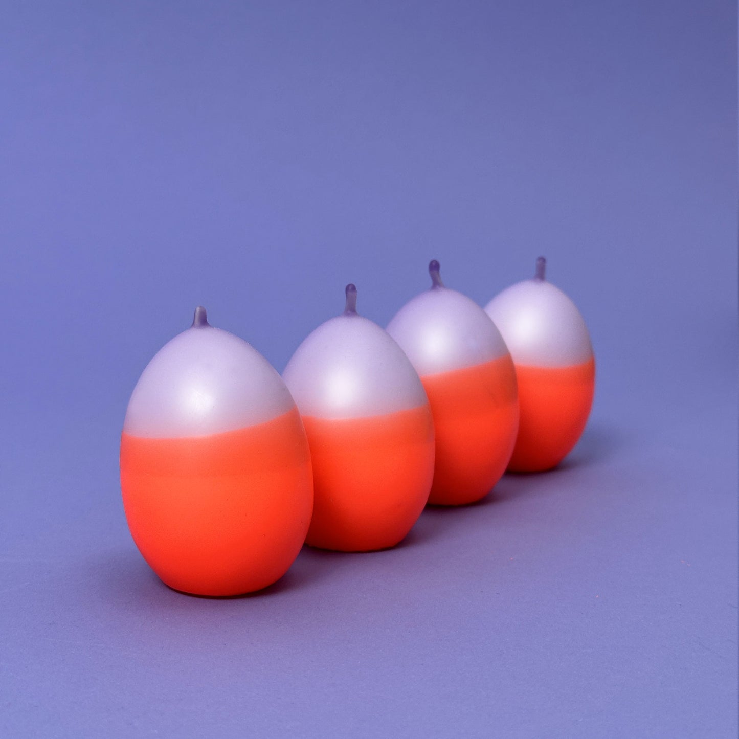 Knallereier LILAFREUDE | 4er-Set Osterkerzen | Neonorange + Malve